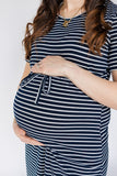 Navy and white striped maternity dress with cinched waist and nursing/breastfeeding panel