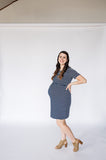 Navy and white striped maternity dress with cinched waist and nursing/breastfeeding panel